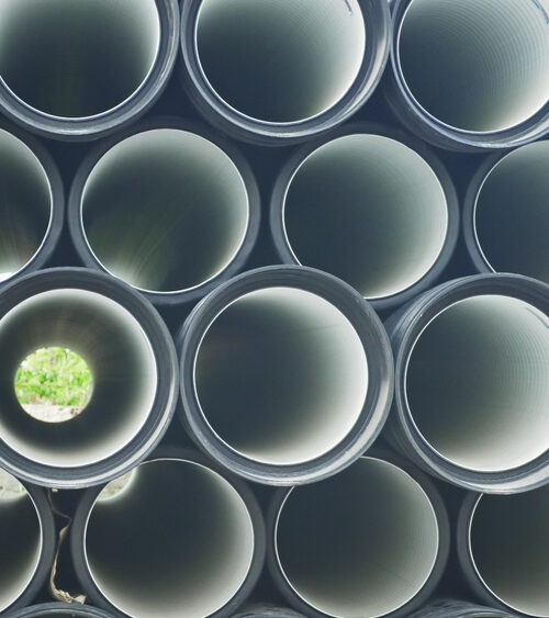 Warehouse,Of,Finished,Plastic,Pipes,Industrial,Outdoors,Storage,Site.,Manufacture