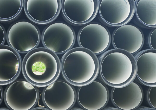 Warehouse,Of,Finished,Plastic,Pipes,Industrial,Outdoors,Storage,Site.,Manufacture