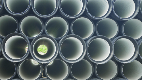 Warehouse,Of,Finished,Plastic,Pipes,Industrial,Outdoors,Storage,Site.,Manufacture Warehouse,Of,Finished,Plastic,Pipes,Industrial,Outdoors,Storage,Site.,Manufacture